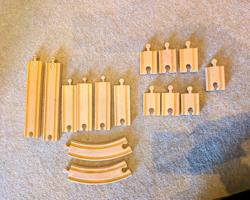 Wooden train track pieces - train,